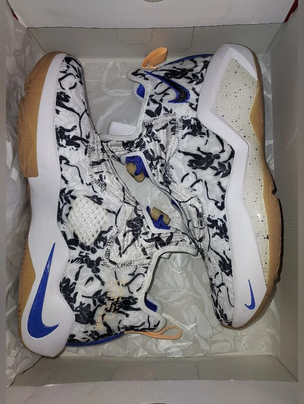 Nike Men’s White Floral Training Shoes with Black Print and Blue Details